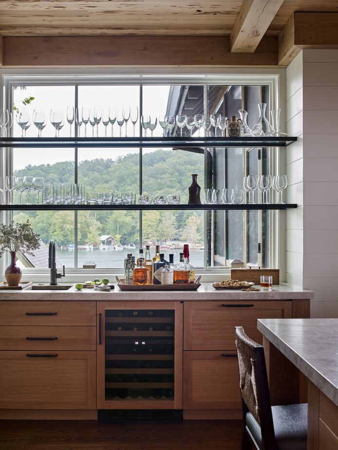 Because the shelves across the window hold mostly glassware, the lake is still clearly visible.
